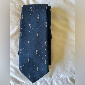 YSL tie, worn for a few years. Properly dry cleaned. Many compliments!